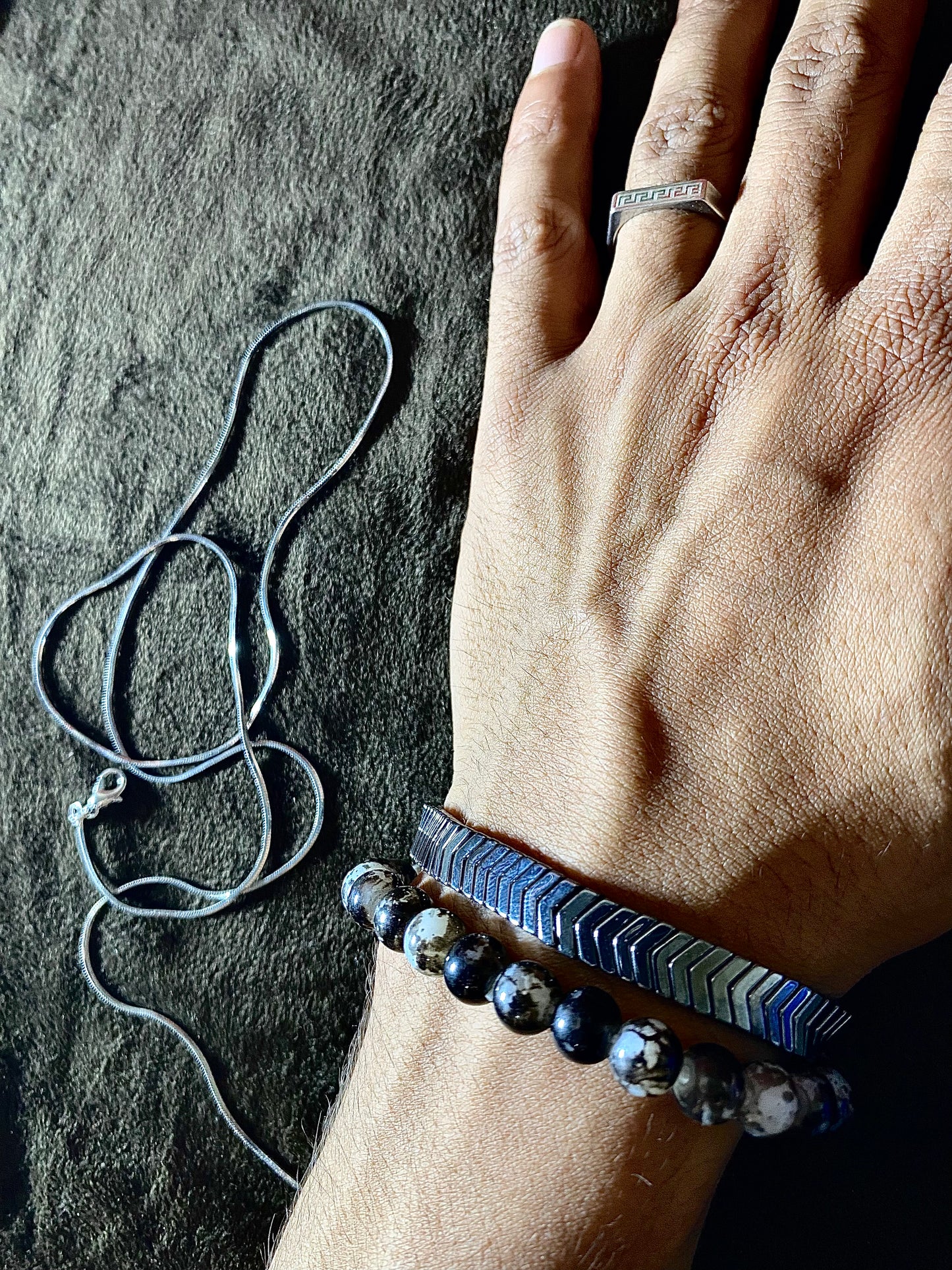 Mega Deal -( 1 Moon Stone Bracelet) - (1 Versace steal ring ) ( 1 Slim Steal chain ) or ( 1 sapphire Trending bracelet )