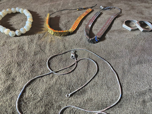 Mega Deal -( 1 Moon Stone Bracelet) - (1 Versace steal ring ) ( 1 Slim Steal chain ) or ( 1 sapphire Trending bracelet )